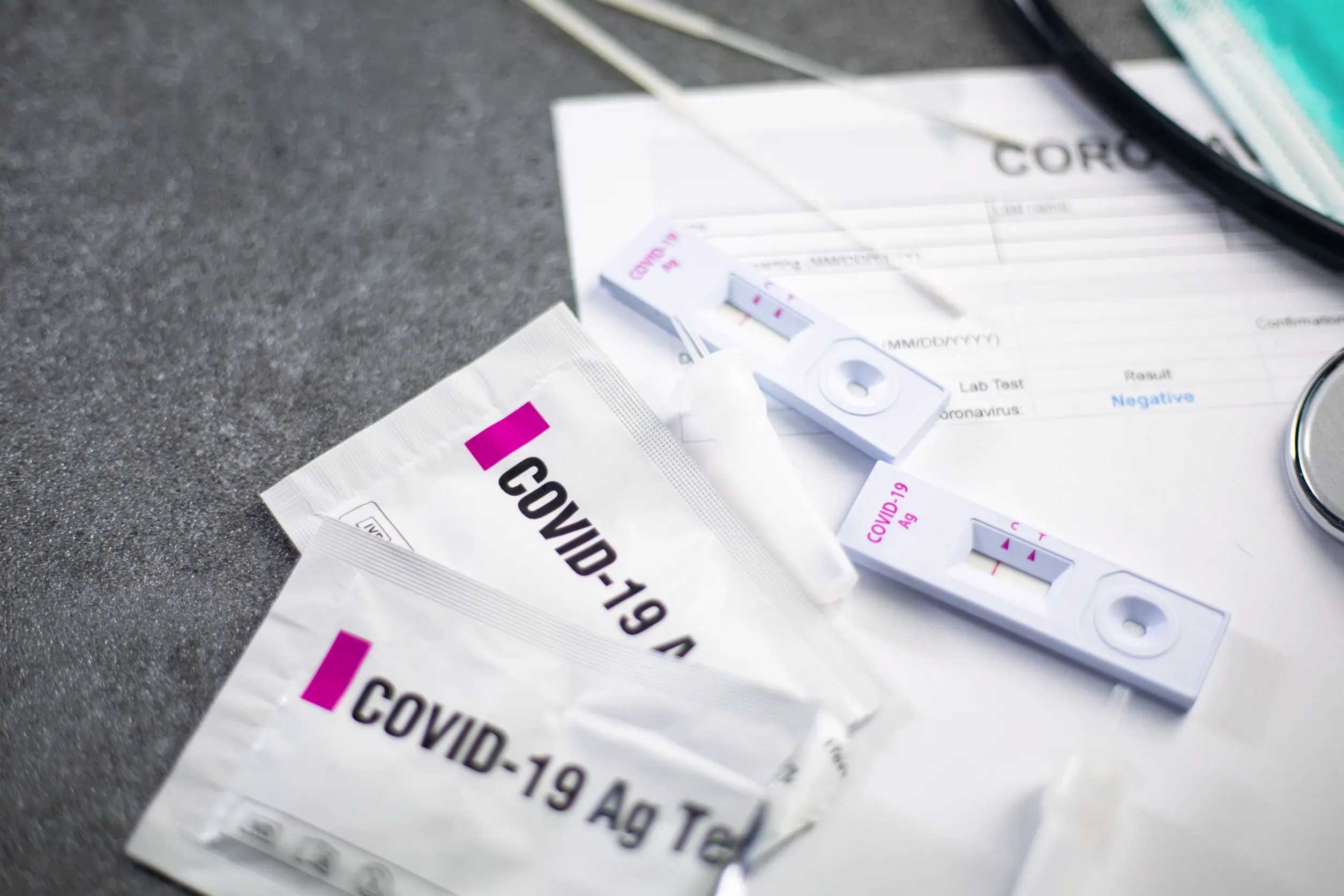 Rapid Antigen Test kit for check coronavirus result is negative result with report document.Covid-19 Ag with nasal rapid test.Healthy fast checking virus disease infection.